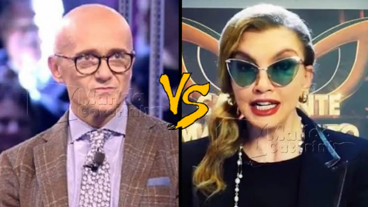 Signorini vs Carlucci le mosse segrete del GF Vip contro Il Cantante mascherato